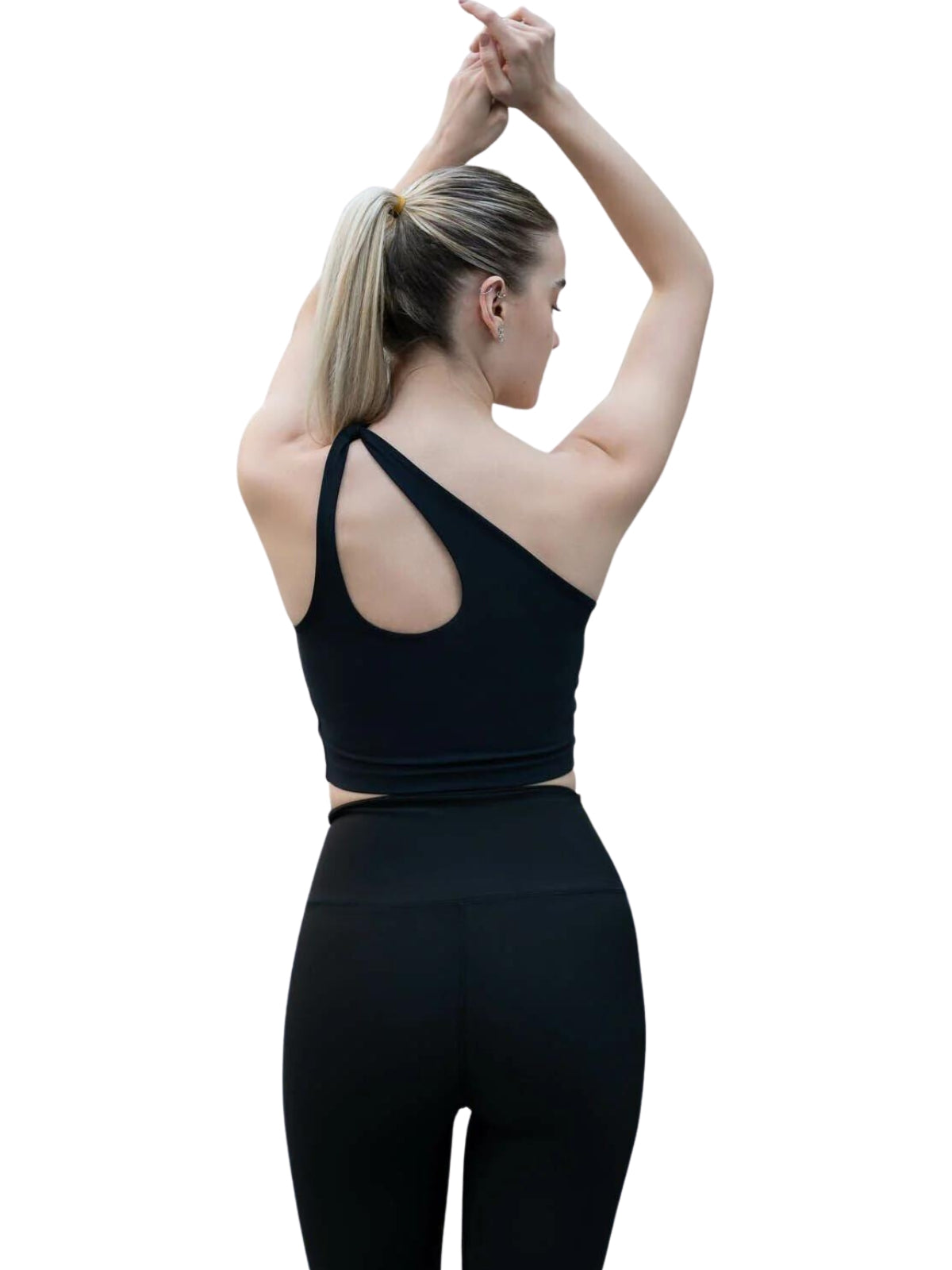 Person im 388 Sevres Sport Bustier von Lismina, von hinten gesehen mit erhobenen Armen und gefalteten Händen, verkörpert Fitness.