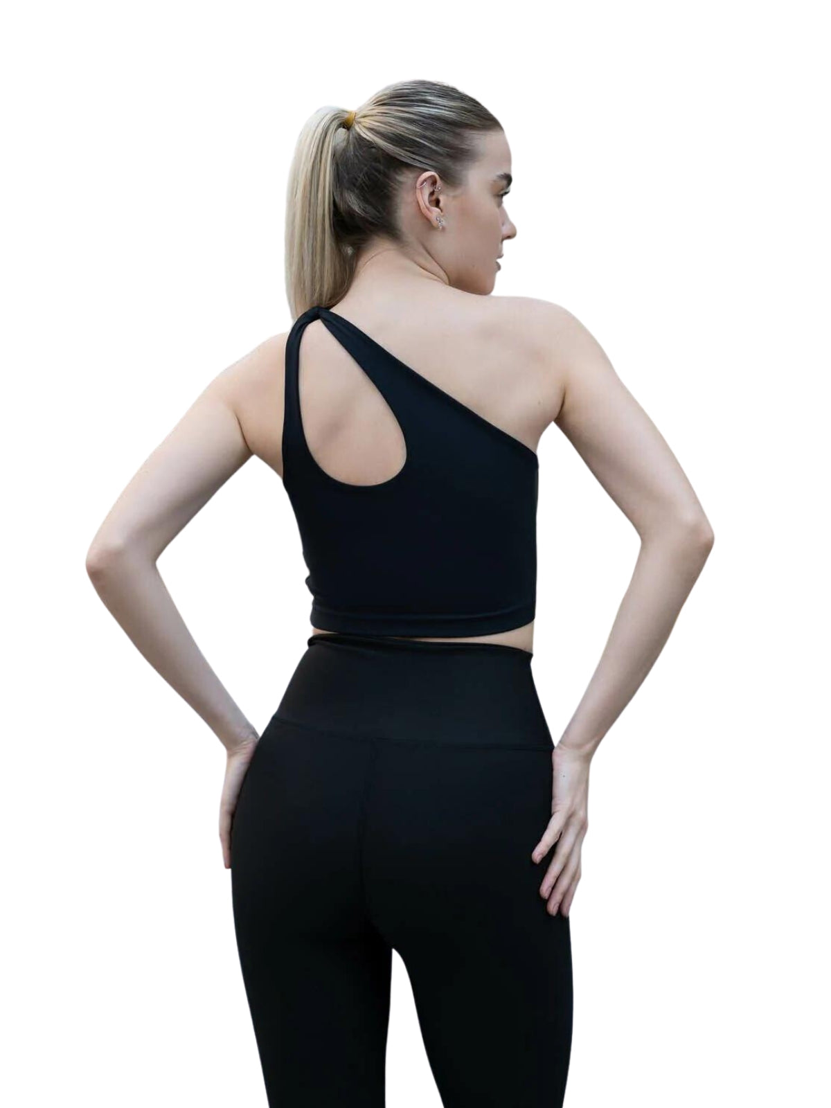 Frau in Lisminas 388 Sevres Sport Bustier in Schwarz, Pferdeschwanz hochgesteckt, Rücken zur Kamera.