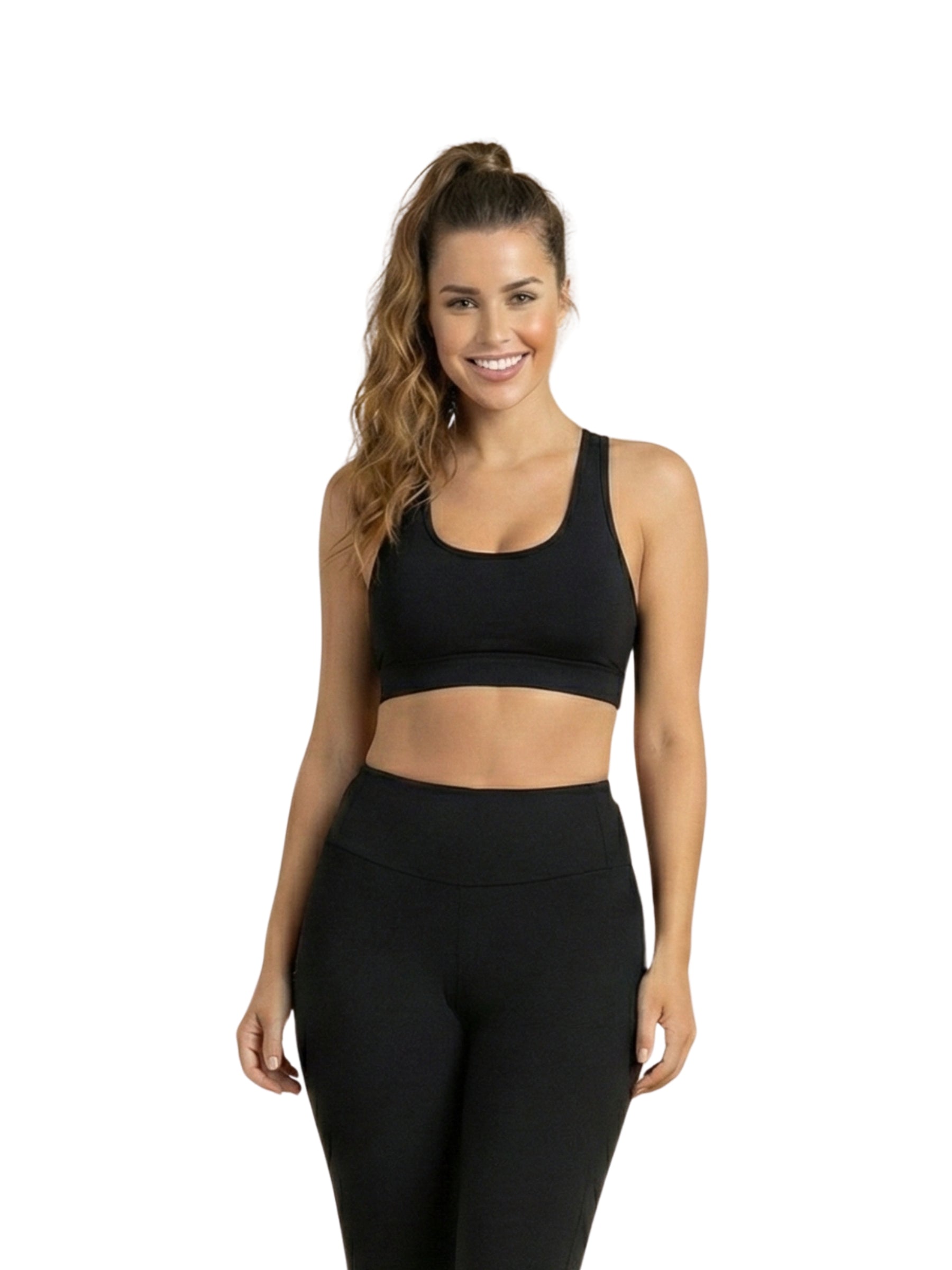 Frau trägt Lismina 396 Bron Sport Bra in Schwarz und lächelt vor weißem Hintergrund.