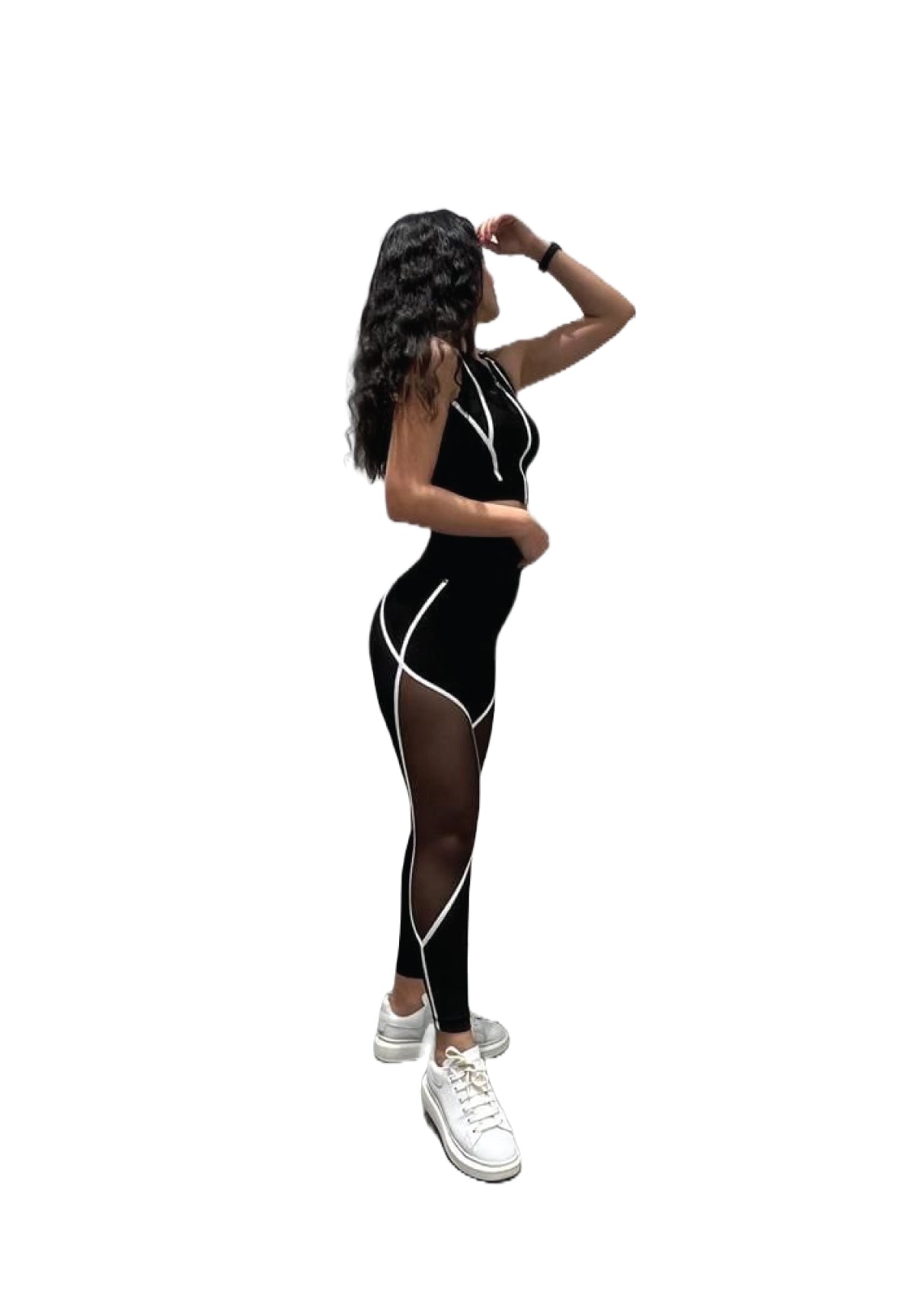 Frau in Lisminas 378 High Waist Tulle Leggings in Schwarz/Weiss macht eine Yoga-Pose, Hand auf dem Kopf vor einem weißen Hintergrund.