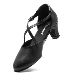 Rumpf's 2020 Broadway Tanzschuhe in Schwarz: schwarze Absätze mit Kreuzriemen, runder Spitze, Chromledersohle & Schnalle.