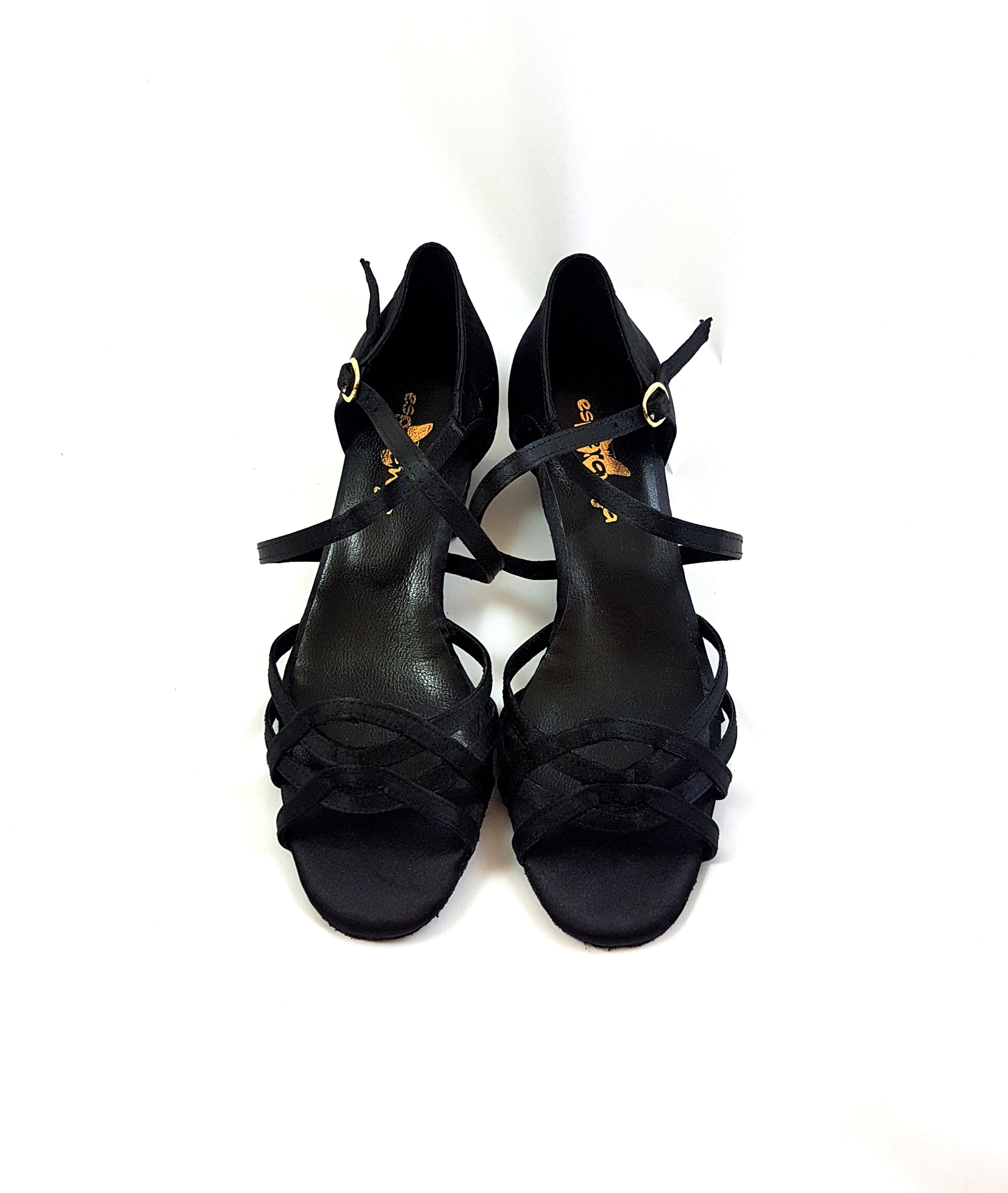 Ein Paar Esperanza-Tanzschuhe für Kinder von Dancing Queens mit gekreuztem Design in Schwarz.