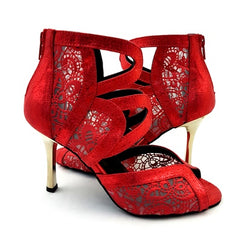 Lyra Tanzschuhe in Rot von Dancing Queens: Rote offene Stilettos mit speziellem Muster und überkreuzten Riemen.