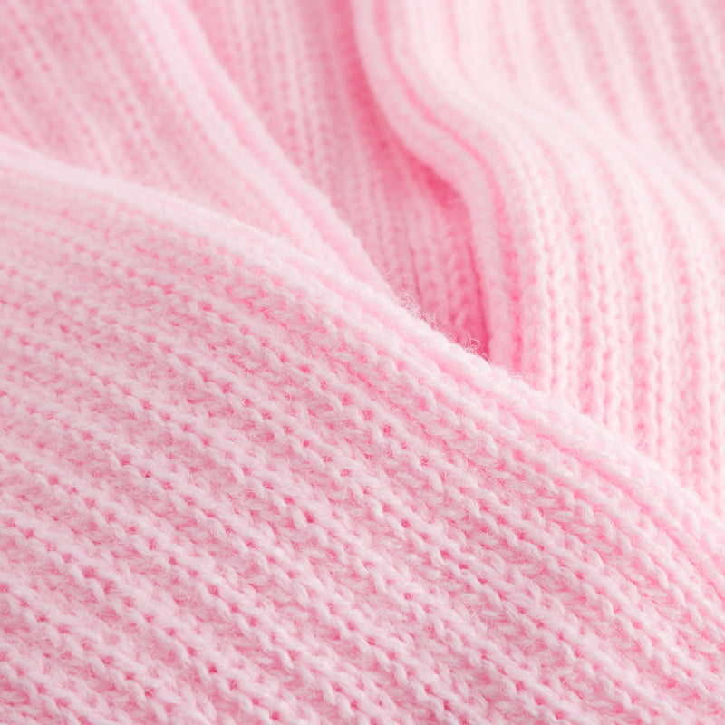 Nahaufnahme des rosafarbenen Rippstrickstoffs Rumpf 1120, ideal für Wärmeschutz.