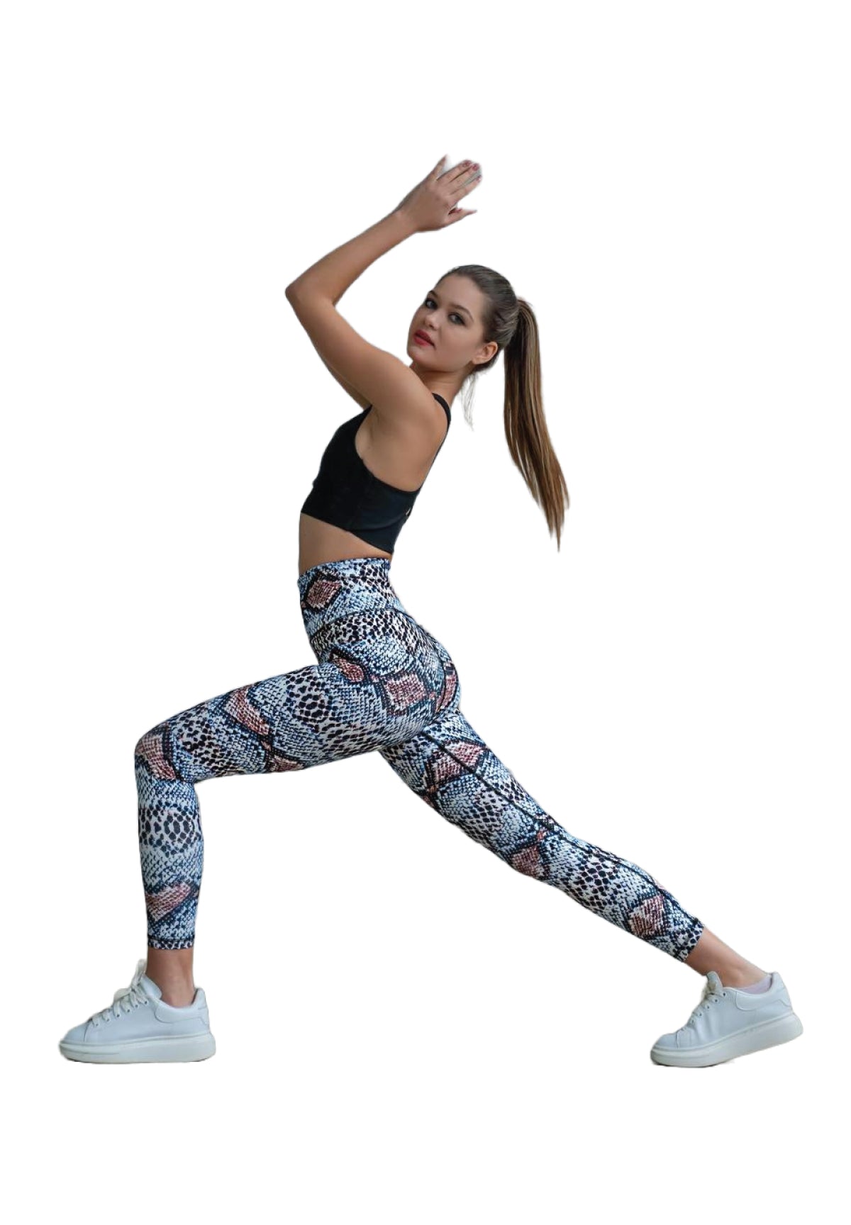 Sportliche Person posiert in Lisminas 328 Extra High Waist Leggings in Braun & Blau, die Arme erhoben.