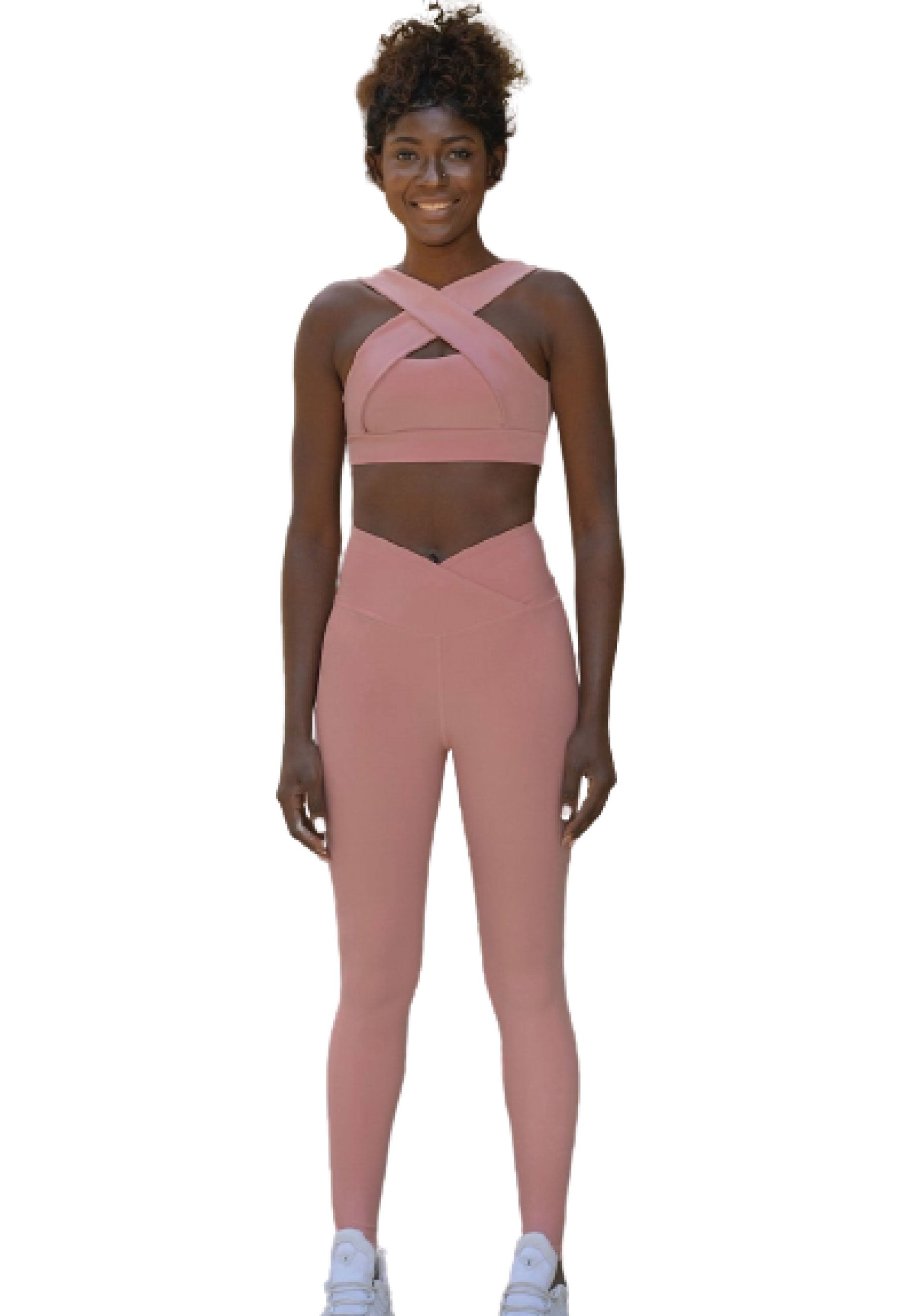 Person in Lismina 1099 Ve Waist Leggings in Rose, trägt Turnschuhe und lächelt.